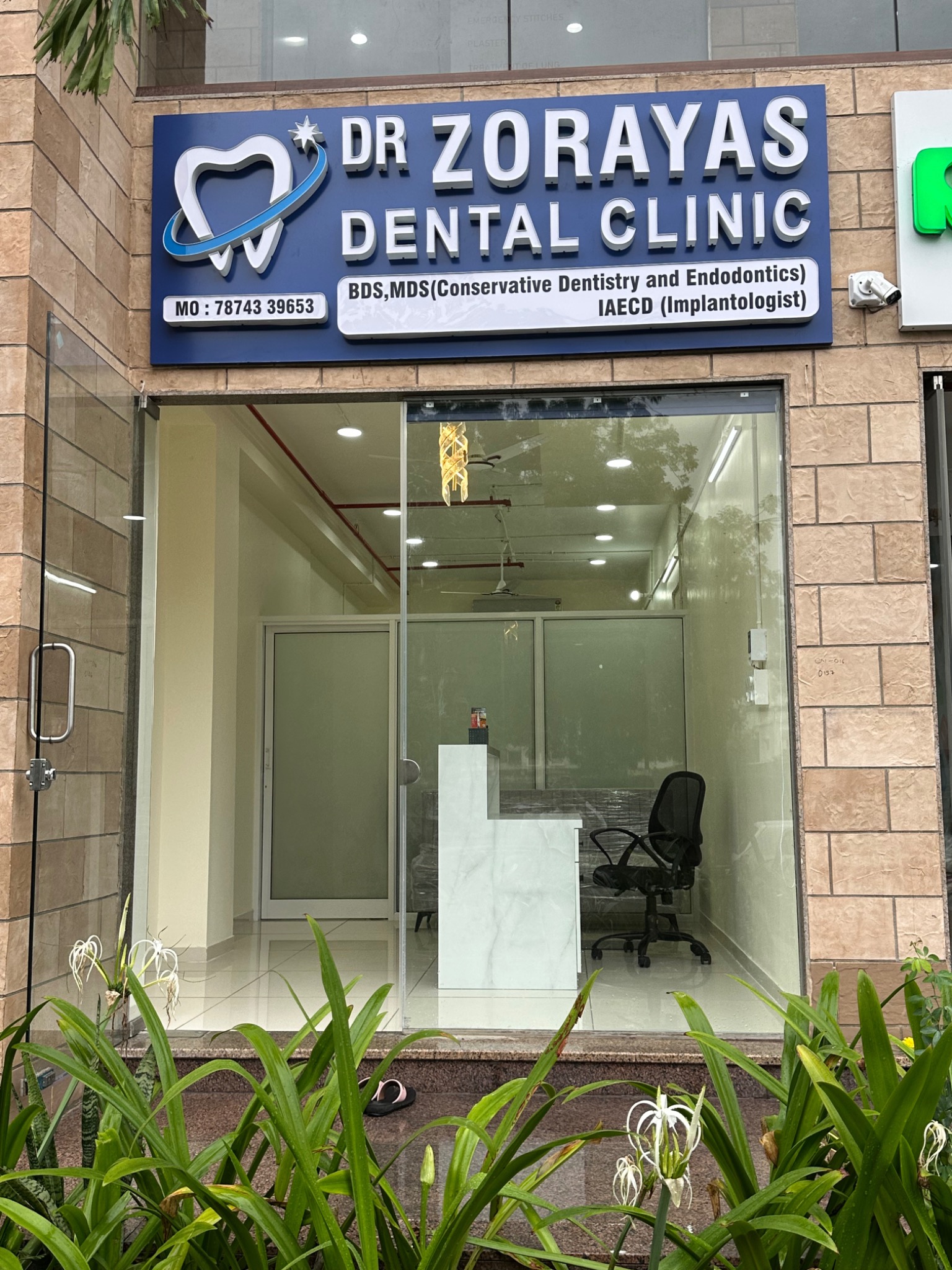 Dr Zorayas Dental Clinic exterior with illuminated LED signboard